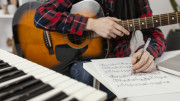 close-up-hand-writing-song