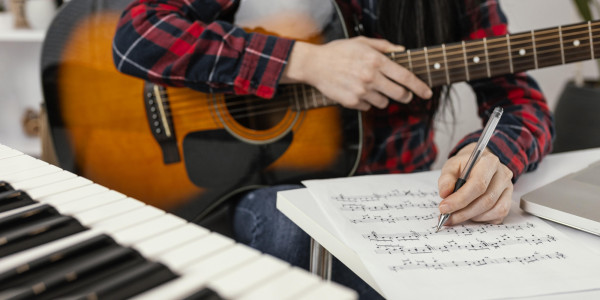 close-up-hand-writing-song